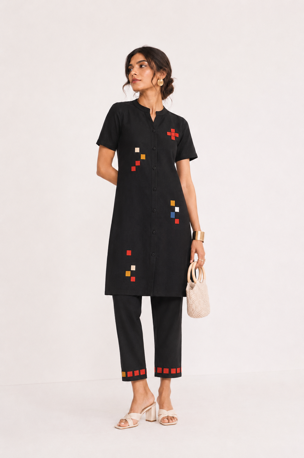 Woman in black coord set from Cords Theory - Organic Cotton