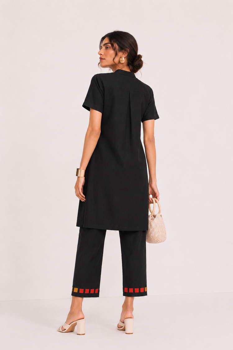 Woman in pixelated Black tunic cotton Coord Set- back view