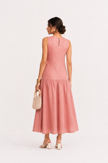 Woman in a Linen pink dress - back view